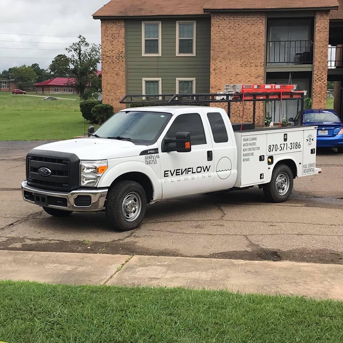 Evenflow Plumbing utility truck at a job site